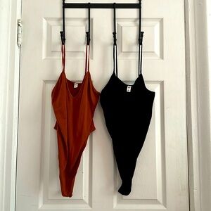 Two ribbed thong bodysuits